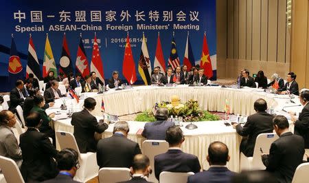 China's Foreign Minister Wang Yi (C) speaks during the Special ASEAN-China Foreign Ministers' Meeting in Yuxi, Yunnan Province, China, June 14, 2016. China Daily/via REUTERS