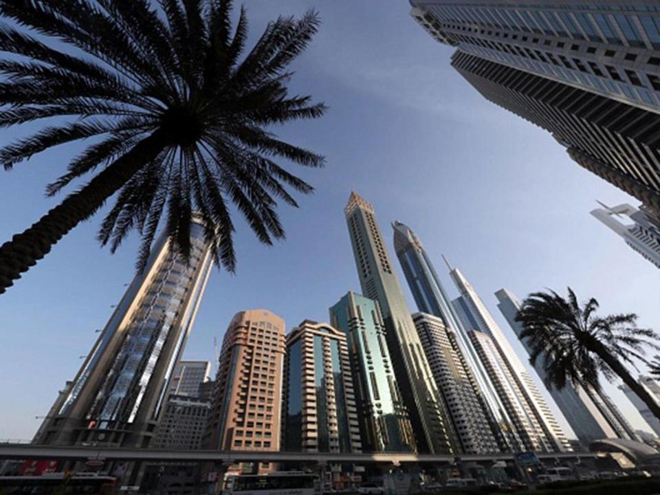 The 75-storey Gevora Hotel, the central gold tower with reflective cladding, which stands 356 metres or nearly a quarter of a mile tall (Getty Images )