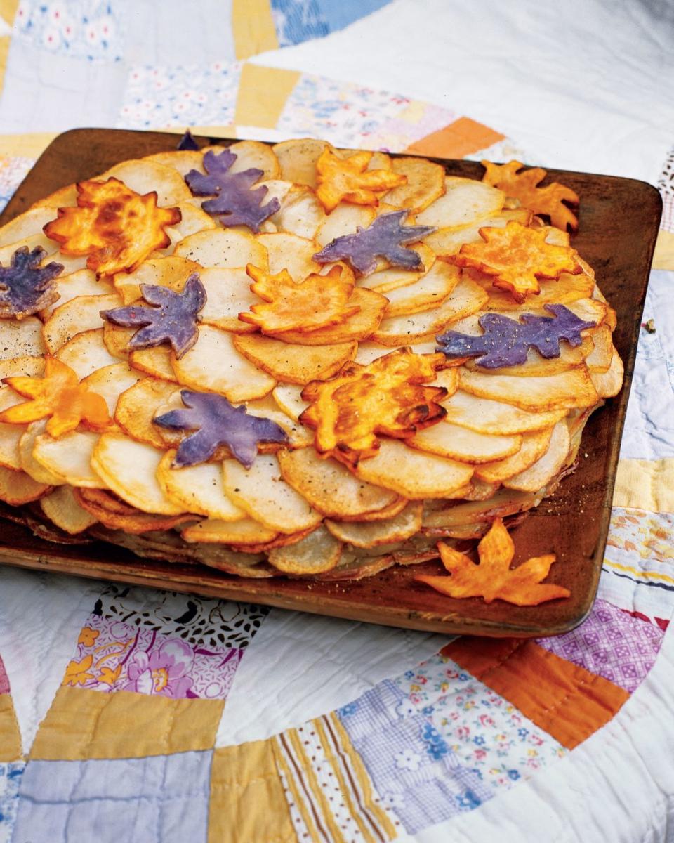 <p>This classic French side dish features buttery layers of thin-sliced potatoes that are baked until tender and golden on the top. </p><p><strong><a href="https://www.countryliving.com/food-drinks/recipes/a1932/potatoes-anna-clv1007/" rel="nofollow noopener" target="_blank" data-ylk="slk:Get the recipe for Potatoes Anna;elm:context_link;itc:0;sec:content-canvas" class="link ">Get the recipe for Potatoes Anna</a>.</strong></p>
