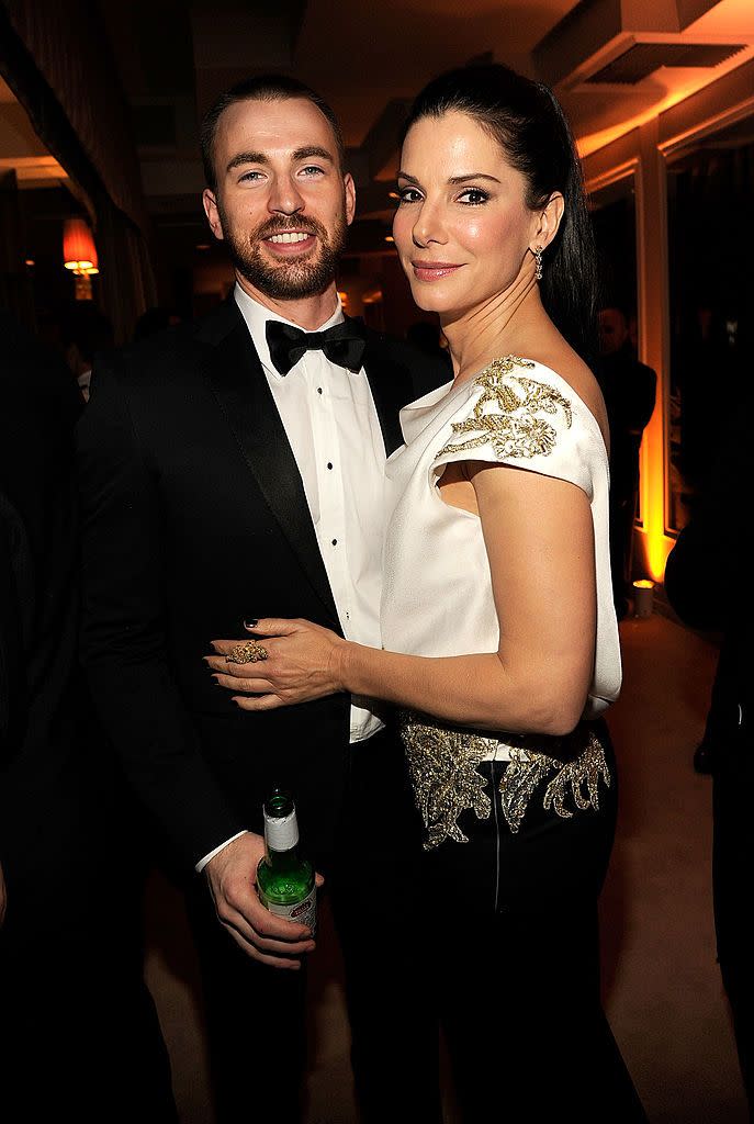 west hollywood, ca february 26 exclusive access special rates apply no north american on air broadcast until march 1, 2012 chris evans and sandra bullock attend the 2012 vanity fair oscar party hosted by graydon carter at sunset tower on february 26, 2012 in west hollywood, california photo by kevin mazurvf12wireimage