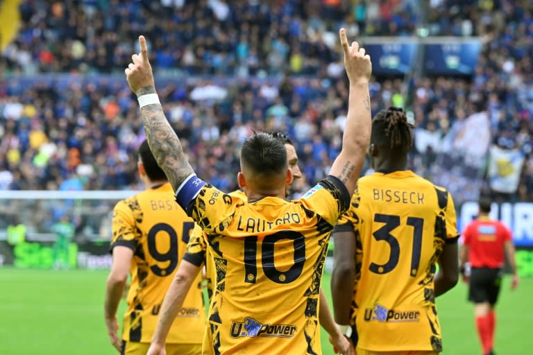 Lautaro Martinez celebrates scoring Inter Milan's second goal during their 3-2 Serie A win at Udinese (ANDREA PATTARO)