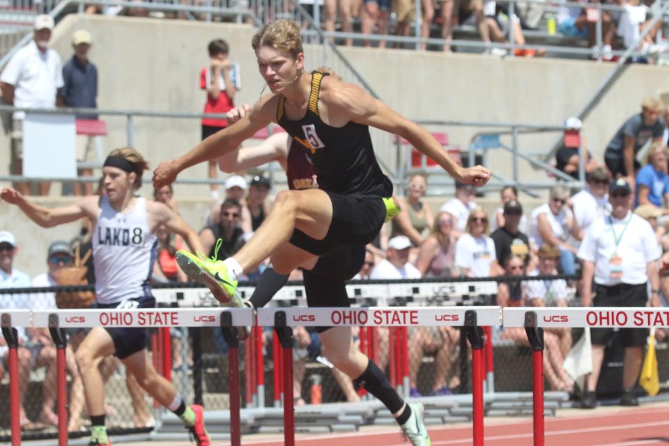 Colonel Crawford's Trevor Vogt won his heat in the 300-meter hurdles.