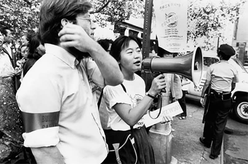 ILGWU Local 23-25 members and rally organizers at the Chinatown Rally in support of the new union contract that was held in Columbus Park, New York. Rallies took place on June 24, 1982 and July 15, 1982. (Courtesy of The Kheel Center ILGWU Collection, Cornell University)