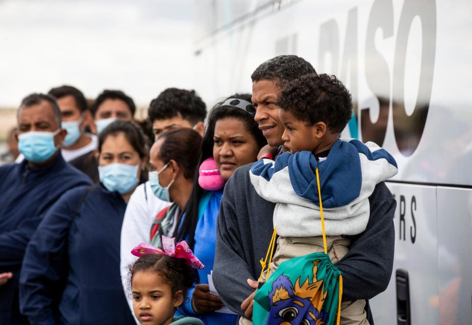 Katiuska Leal Moreno is pictured with her husband Kristian Gonzalez Perez and their two children as they boarded a bus to New York City in October 2022 from El Paso, Texas, after they sought asylum at the U.S. border.