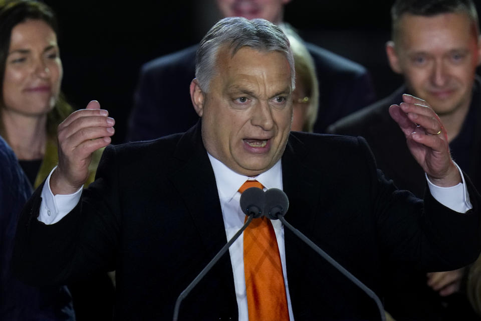 Hungary's Prime Minister addresses cheering supporters during an election night rally in Budapest, Hungary, Sunday, April 3, 2022. Early partial results in Hungary's national election are showing a strong lead for the right-wing party of pro-Putin nationalist Orban as he seeks a fourth consecutive term. (AP Photo/Petr David Josek)