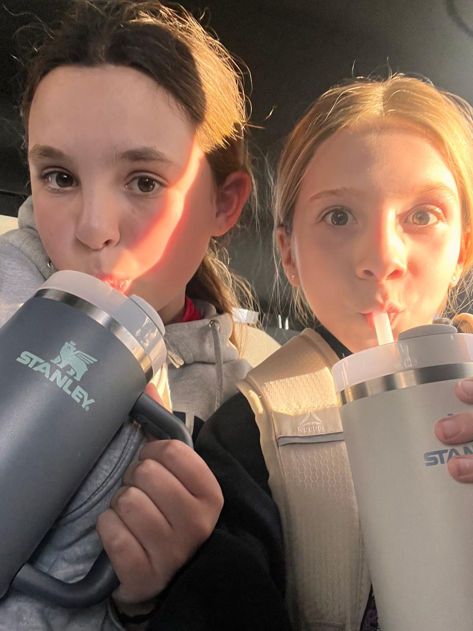 Harper Walters, 11, and Claire Joslin, 10, both of Lincoln Park, bring their 30 ounce Stanley's with them to middle school to use throughout the day.
