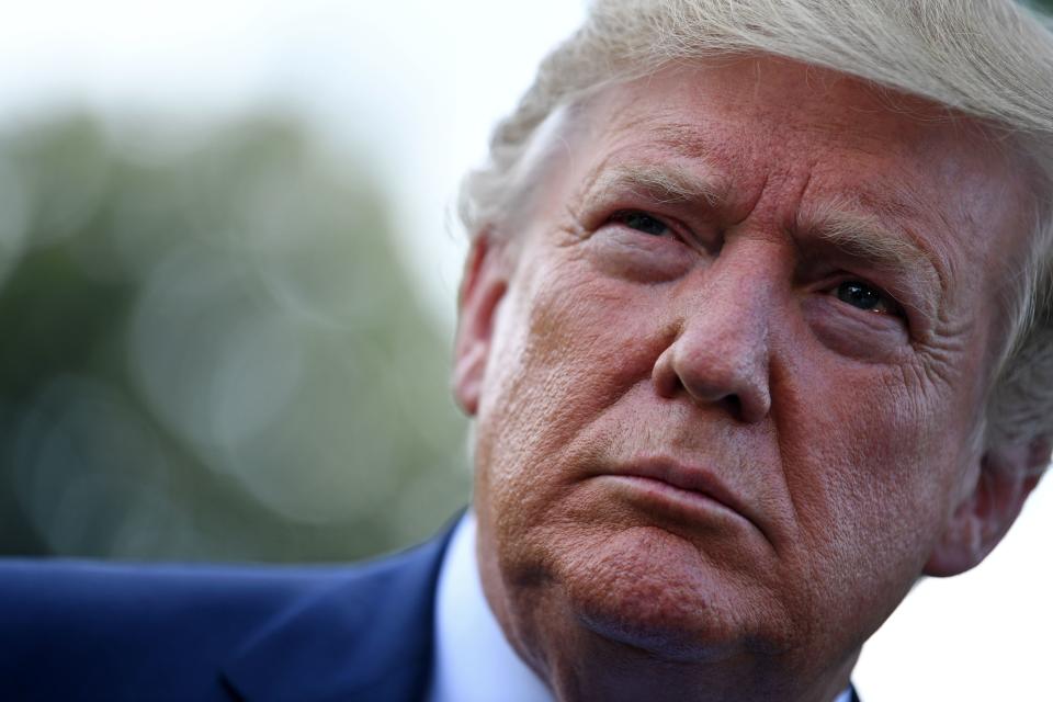 US President Donald Trump speaks to the press at the White House as he departs for Bedminster on August 2, 2019, on Washington, DC. (Photo by Brendan Smialowski / AFP)        (Photo credit should read BRENDAN SMIALOWSKI/AFP/Getty Images)