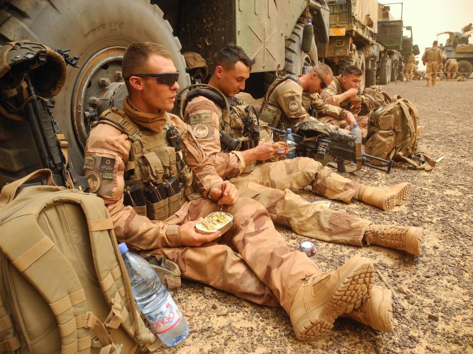 French soldiers eating rations in Mali.