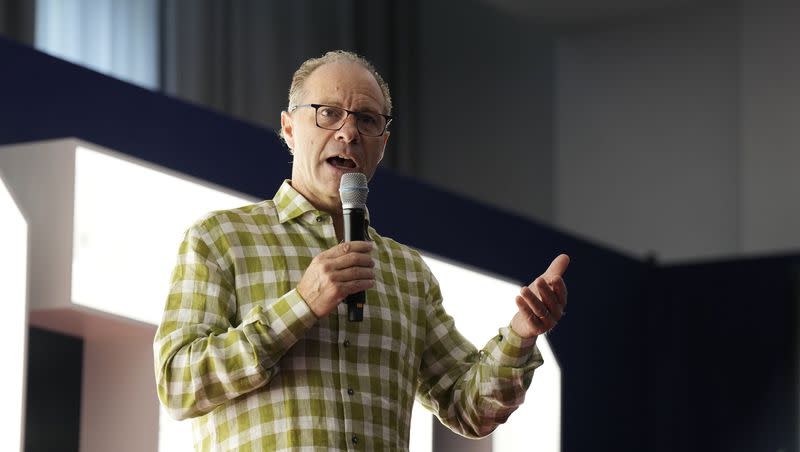 Author Jeff Benedict speaks on stage at the Patriots Haus in Frankfurt, Germany, Friday, Nov. 10, 2023. One of his books, “The Dynasty, is focused on the New England Patriots.