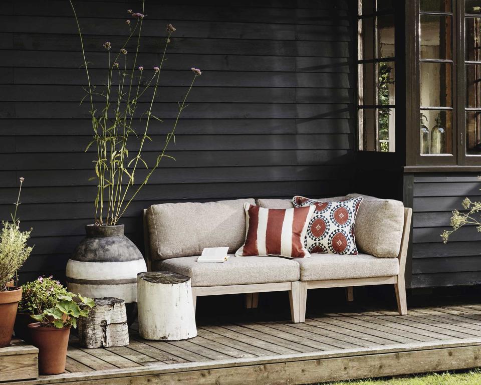 Tuck a small sofa into a decked space