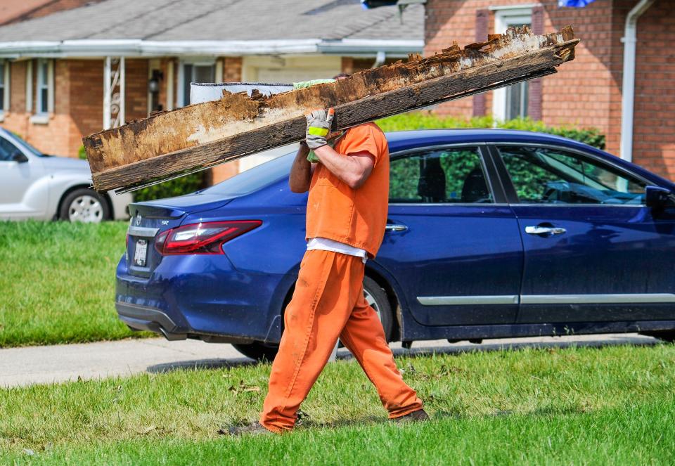 Volunteer groups, residents and even some trustees form Montgomery County Jail worked together Saturday, June 1 to clear debris from some of the neighborhoods in Trotwood and other areas hit by the tornado (WHIO File)