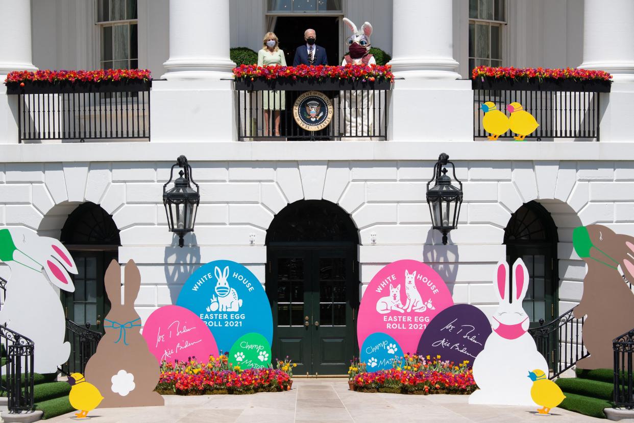 President Joe Biden speaks, alongside First Lady Jill Biden (L) and the Easter Bunny (C), about the Easter holiday and the traditional White House Easter Egg roll, which was not held this year because of COVID-19, on the South Lawn of the White House in Washington, DC on April 5, 2021.