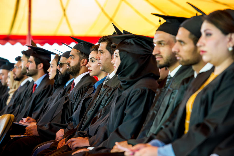 FILE: More than 100 Afghan students from the American University of Afghanistan (AUAF) wait to receive their diplomas at a graduation ceremony on campus on May 21, 2019, in western Kabul, Afghanistan.  / Credit: Scott Peterson/Getty Images