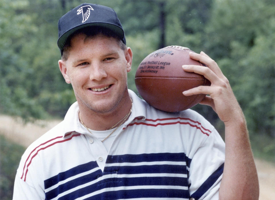 FILE - Brett Favre, drafted by the Atlanta Falcons, at his home in Mississippi, April 30, 1991. The Falcons traded Favre to Green Bay for a first-round pick. Favre won three MVPs and ended up as one of the game's most prolific passers ever with 71,838 yards and 508 TDs. (Atlanta Journal-Constitution via AP, File)