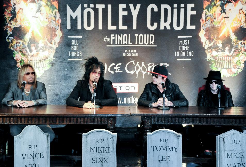 From left, Vince Neil, Nikki Sixx, Tommy Lee, and Mick Mars attend the Motley Crue Press Conference, Tuesday, Jan. 28, 2014, in Los Angeles. The heavy-metal band says it will retire after performing 72 goodbye concerts. The band made the announcement at their press conference. (Photo by Richard Shotwell/Invision/AP)