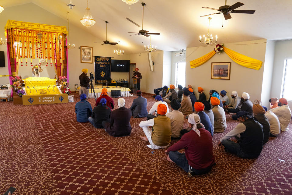 Members of the Sikh Coalition gather at the Sikh Satsang of Indianapolis in Indianapolis, Saturday, April 17, 2021 to formulate the groups response to the shooting at a FedEx facility in Indianapolis that claimed the lives of four members of the Sikh community. A gunman killed eight people and wounded several others before taking his own life in a late-night attack at a FedEx facility near the Indianapolis airport. (AP Photo/Michael Conroy)