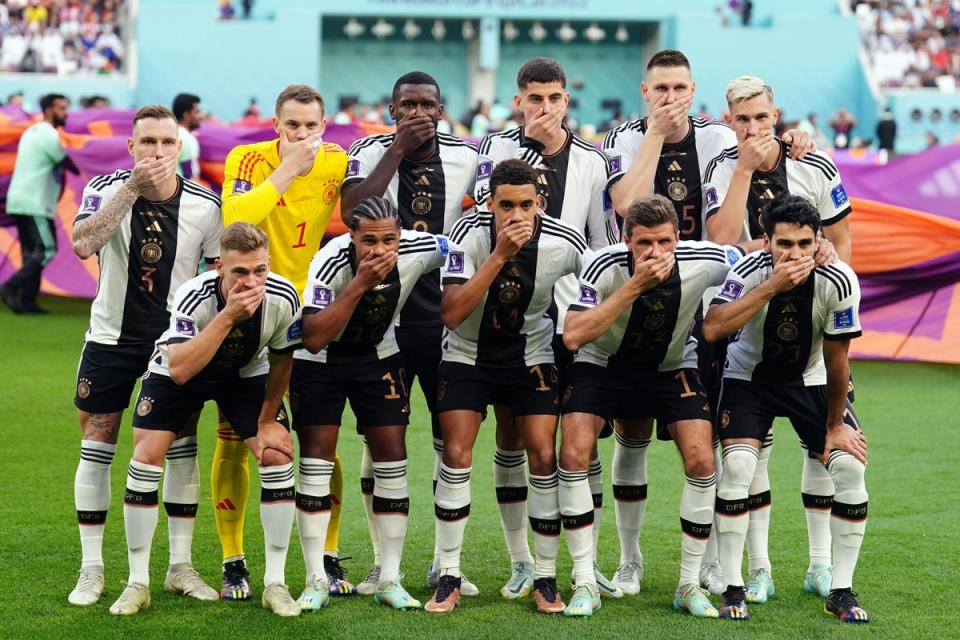 Germany players covered their mouths as a mark of protest at the Khalifa International Stadium in Doha (PA Wire)