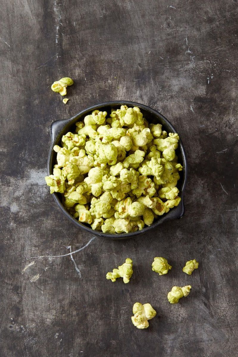 <p>A little bit of green tea matcha turns a regular bowl of popcorn into a ghoulishly good treat. </p><p>Get the <a href="https://www.goodhousekeeping.com/food-recipes/a28542905/green-matcha-popcorn-recipe/" rel="nofollow noopener" target="_blank" data-ylk="slk:Green Matcha Popcorn recipe;elm:context_link;itc:0;sec:content-canvas" class="link "><strong>Green Matcha Popcorn recipe</strong></a>. </p>