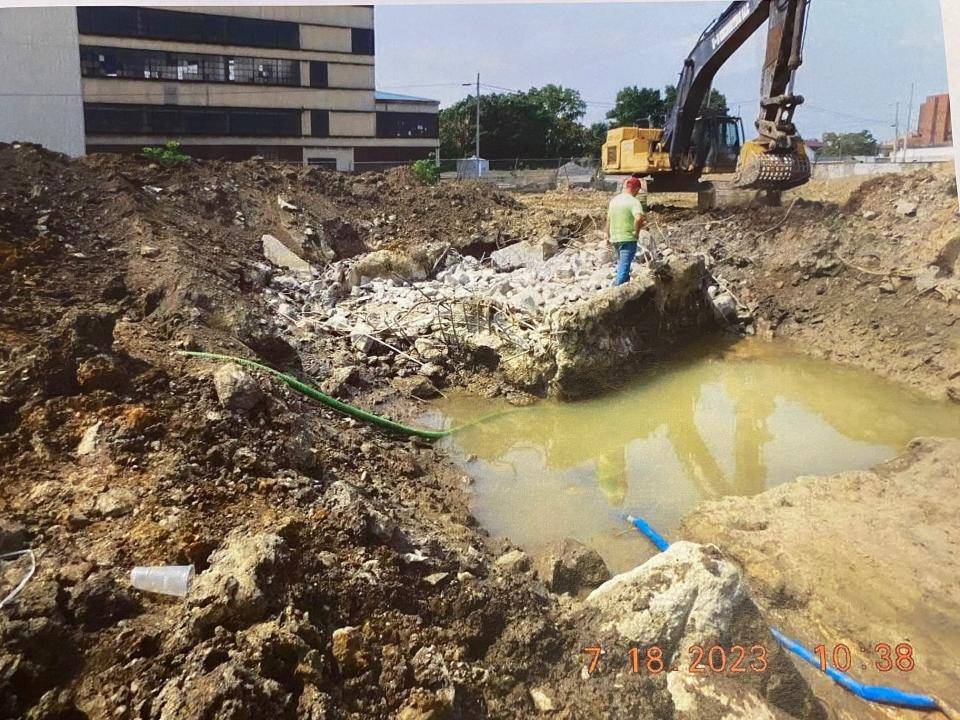 Pits are filled with ground water and possible contaminates waiting environmental consults' input at the former Westinghouse site where demolition is under way. Three water lines are running nonstop and the city has been working on resolving the issues for about 12 weeks, according to the Richland County Land Bank.