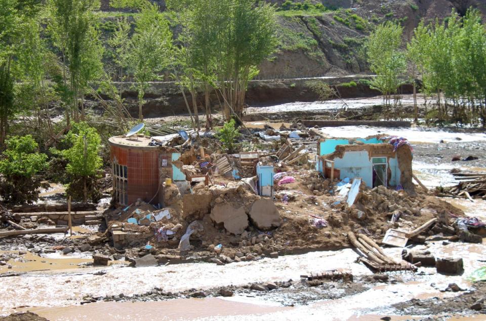 Remainings of houses damaged by the flood are pictured in Firozkoh the capital city of Ghor Province, Afghanistan (REUTERS)