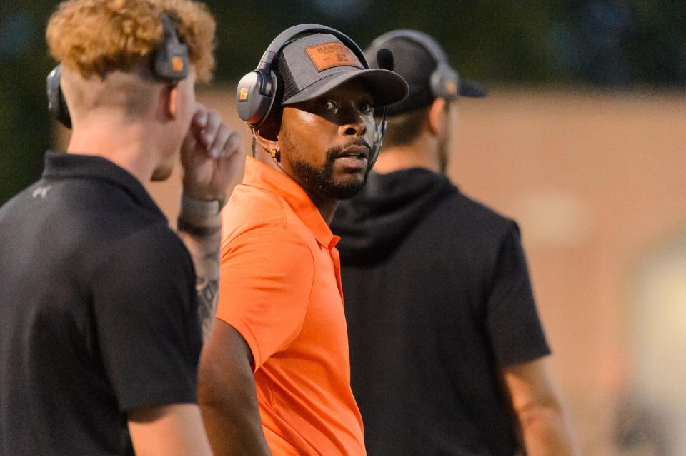 Hanover coach Jarrel Burnett watches his team play during the first half of a game between Hanover and Pequea Valley, Friday, Sept. 8, 2023, at Sheppard-Myers field in Penn Township. Hanover led 14-6 at the half before the second half of the game was postponed until Monday.