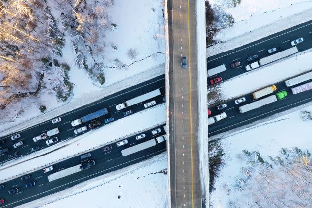 In an aerial view, traffic creeps along Virginia Highway 1 after being diverted away from Interstate 95, which was closed due to a winter storm on Tuesday near Fredericksburg in Stafford County, Virginia. (Photo: Chip Somodevilla/Getty Images)