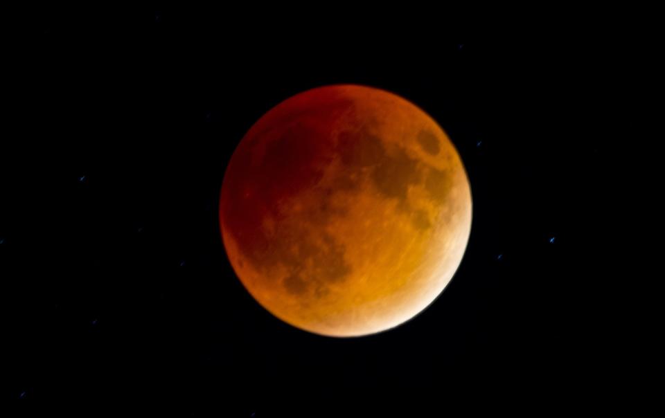 <h1 class="title">Blood moon during lunar eclipse, Mendota Heights, Minnesota, USA</h1><cite class="credit">Getty Images</cite>