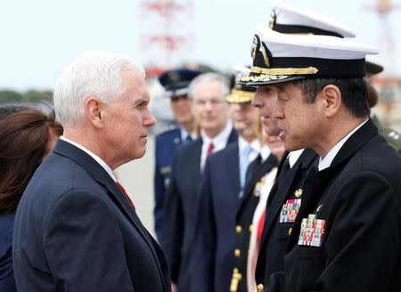 U.S. Vice President Mike Pence arrives at Atsugi naval air base in Ayase, south of Tokyo, Japan, April 18, 2017. REUTERS/Kim Kyung-Hoon