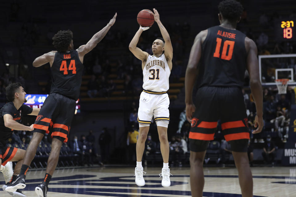 California's Jordan Shepherd (31) shoots against Oregon State's Ahmad Rand (44) during the second half of an NCAA college basketball game in Berkeley, Calif., Thursday, Dec. 2, 2021. (AP Photo/Jed Jacobsohn)