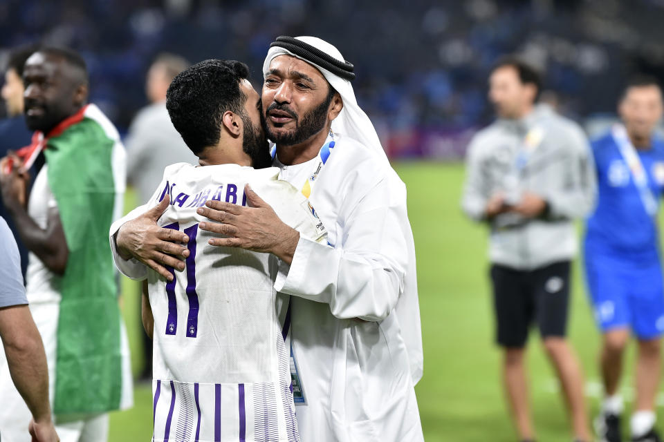 UAE's Al Ain' player Bandar Al Ahbabi, left, celebrates after the second leg of their AFC Champions League 2023/24 semi-final match against Saudi Arabia's Al Hilal at Kingdom Arena Stadium in Riyadh, Saudi Arabia,Tuesday, April 23, 2024. (AP Photo)