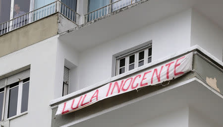 A banner that reads: "Lula is innocent" hangs on a building in Rio de Janeiro, Brazil August 16, 2018. Picture taken August 16, 2018. REUTERS/Sergio Moraes