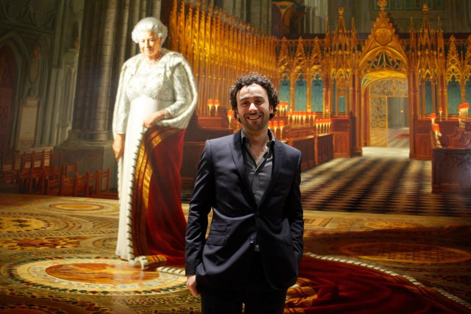 Australian artist Ralph Heimans in front of his painting 'The Coronation Theatre, Westminster Abbey: Portrait of Her Majesty Queen Elizabethh II, 2012' - EPA