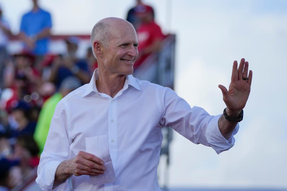Sen. Rick Scott, R-Fla., arrives to speak before former President Donald Trump at a campaign rally in support of the campaign of Sen. Marco Rubio, R-Fla., at the Miami-Dade County Fair and Exposition on Nov. 6 in Miami.