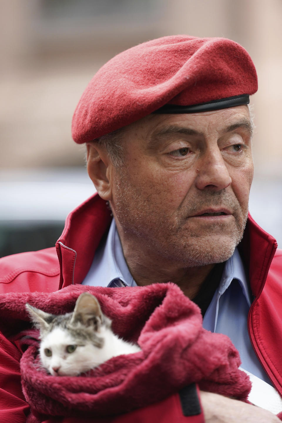 Republican Mayoral candidate Curtis Sliwa talks to reporters with a rescue cat named Gizmo before voting in New York, Tuesday, Nov. 2, 2021. (AP Photo/Seth Wenig)