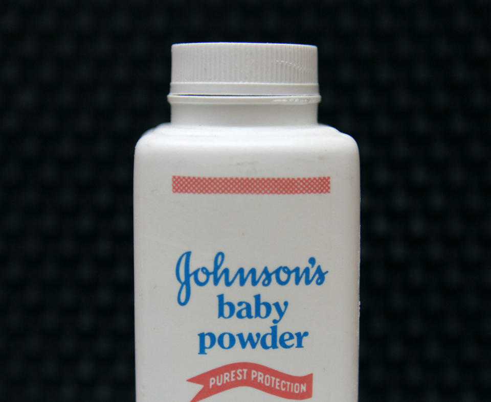 FILE - In this April 15, 2011, file photo, a bottle of Johnson's baby powder is displayed. Johnson & Johnson is ending production of its iconic talc-based Johnson’s Baby Powder, which has been embroiled in thousands of lawsuits claiming it caused cancer. The world’s biggest maker of health care products said Tuesday, May 19, 2020 that the discontinuation only affects the U.S. and Canada, where demand has been declining. (AP Photo/Jeff Chiu, File)