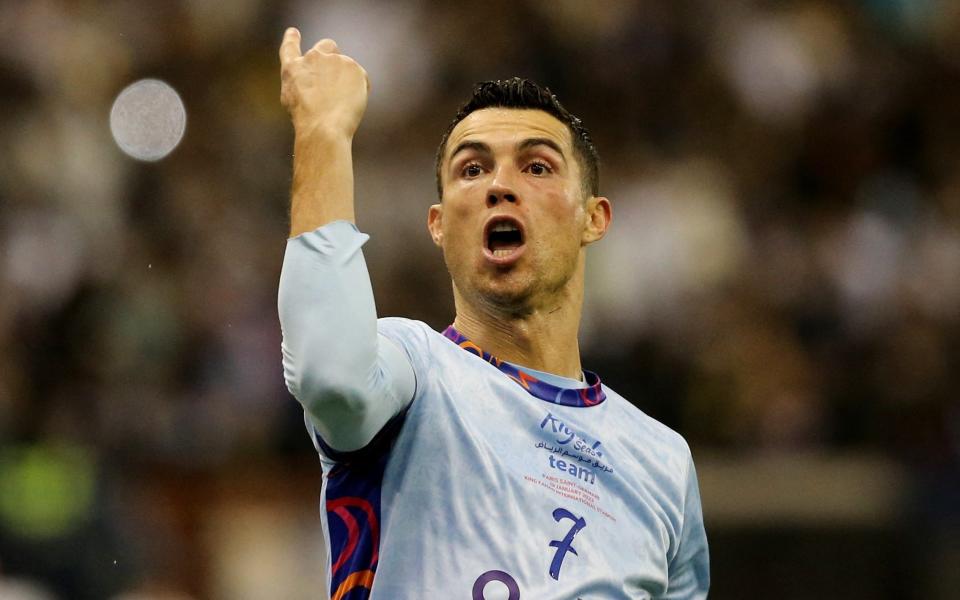 audi Pro League XI's Cristiano Ronaldo celebrates scoring their first goal - REUTERS