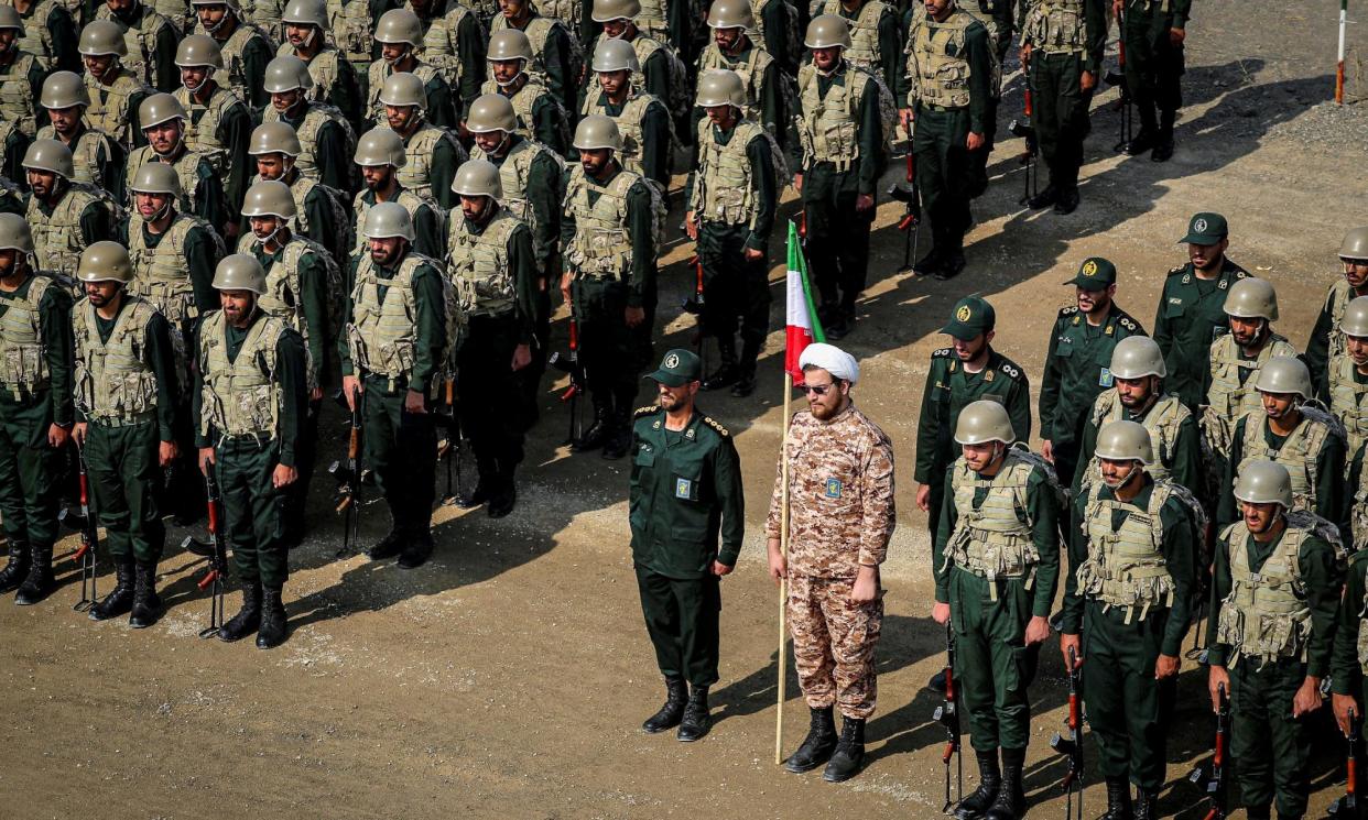<span>Members of the Islamic Revolutionary Guard Corps taking part in a drill. The IRGC was established after Iran’s 1979 revolution.</span><span>Photograph: Wana News Agency/Reuters</span>