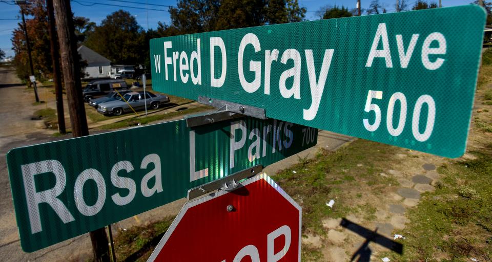 The intersection of Fred Gray Avenue and Rosa Parks Avenue in Montgomery, Ala., is seen on Thursday November 18, 2021. Jeff Davis Avenue was renamed after civil right attorney Fred Gray, who represented Road Parks.