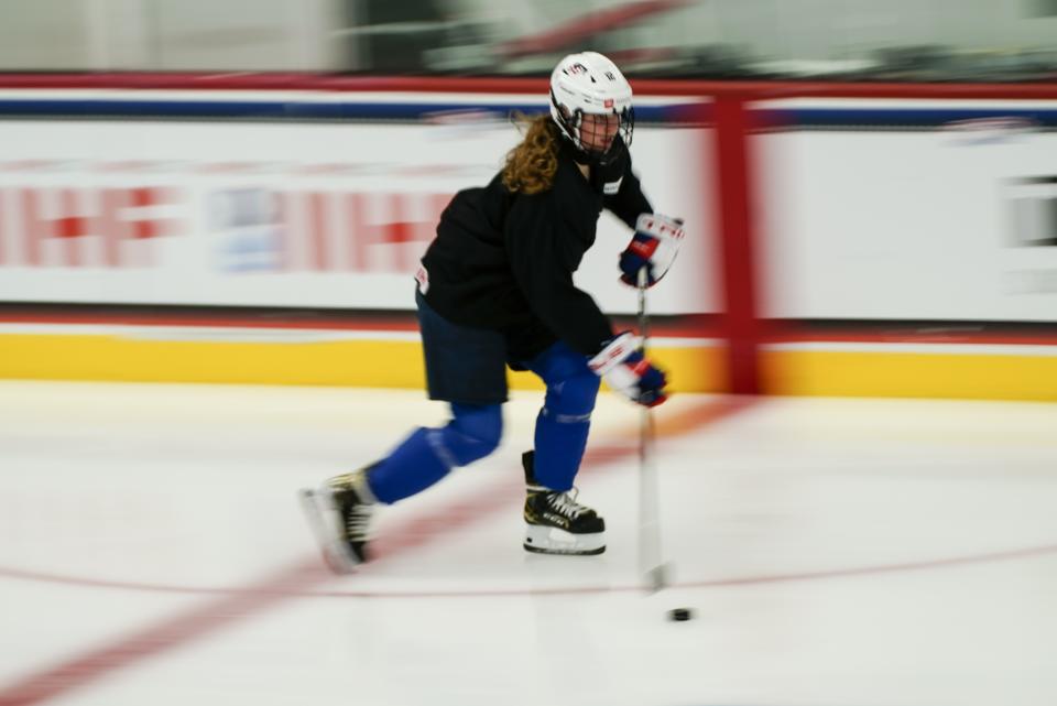 Sydney Morrow practices for the 2022 U.S. U18 Women's World Hockey Championships Saturday, June 11, 2022, in Madison, Wis. Nearly one-third of the players on the U.S. women's hockey team competing in this week’s under-18 World Championships are training at programs outside their home states. (AP Photo/Morry Gash)