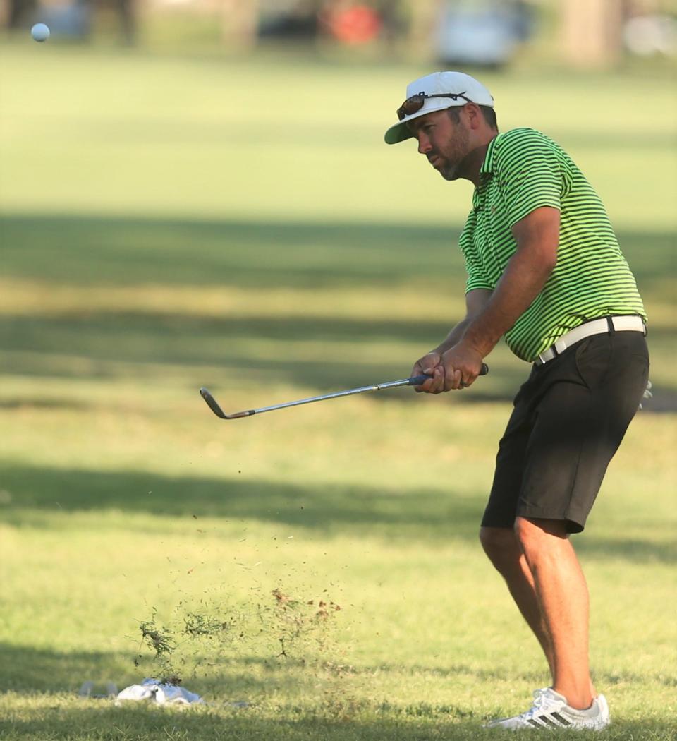 Mike Hillis chips onto the 16th green during the final round of the San Angelo Country Club Men's Partnership on Sunday, June 26, 2022.