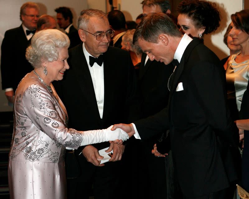 FILE PHOTO: Britain's Queen Elizabeth meets actor Craig during the world premiere of the latest James Bond movie "Casino Royale" at the Odeon cinema in Leicester Square in London