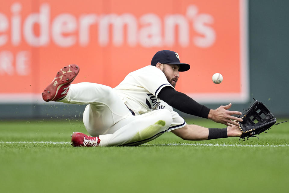 Minnesota Twins left fielder Joey Gallo prepares to catch a ball hit by San Diego Padres' Manny Machado for the out during the first inning of a baseball game Wednesday, May 10, 2023, in Minneapolis. (AP Photo/Abbie Parr)