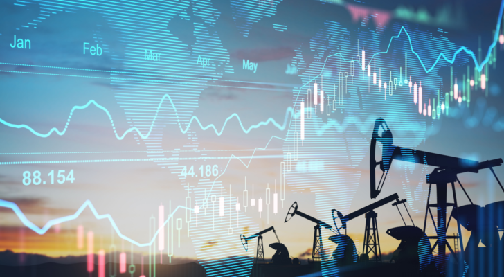 Rise in gasoline prices concept with double exposure of digital screen with financial chart graphs and oil pumps on a field, gas prices