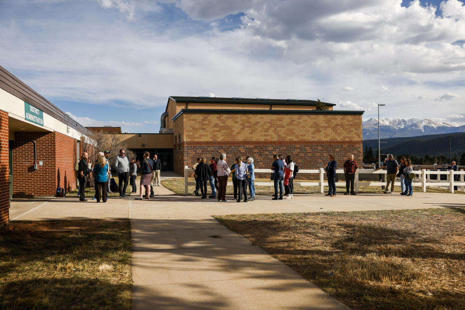 The Woodland Park school board meeting on April 12 drew a line of people to the administration building. (Michael Ciaglo for NBC News)