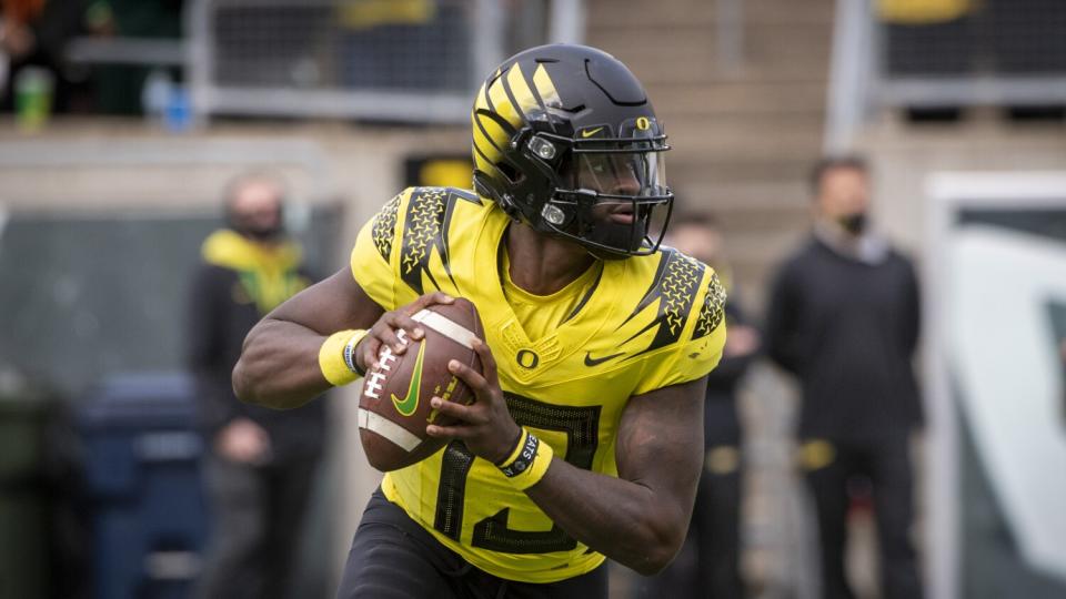 Oregon's Anthony Brown looks to pass