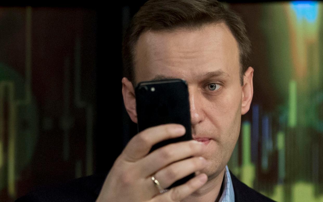 Russian opposition activist Alexei Navalny takes a selfie at the Echo Moskvy (Echo of Moscow) radio station in Moscow on Wednesday - AP