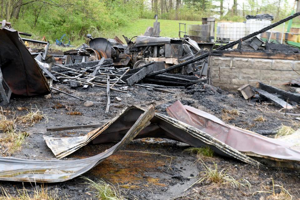 Investigators are working to find the cause of a fire Sunday that destroyed a storage barn on the historic Fasnacht Farm in Perry Township.