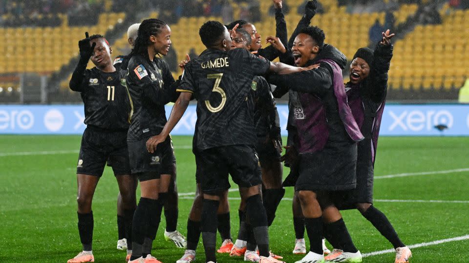 South African players celebrate after taking the lead in their Women's World Cup Group G soccer match against Sweden, though the Banyana Bayana ultimately lost 2-1. - Andrew Cornaga/AP