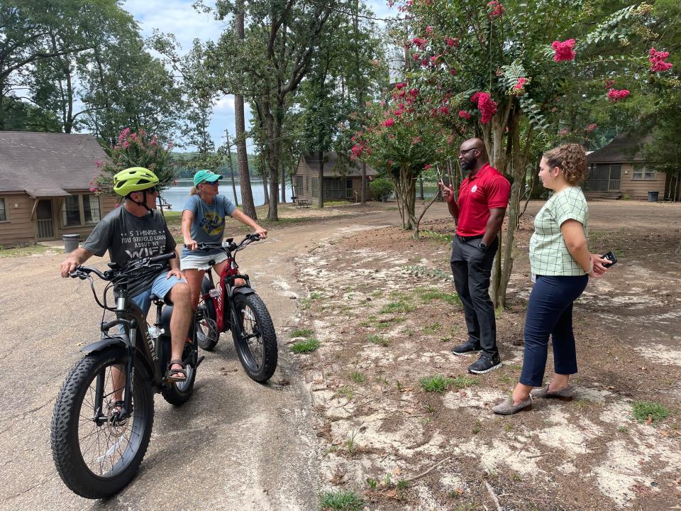 Mike and Laurie Watson of Brandon talk with MDWFP Parks division chief of staff Brian Ferguson and and his assistant Anna Grace Savell about upcoming renovations at Roosevelt State Park and others.