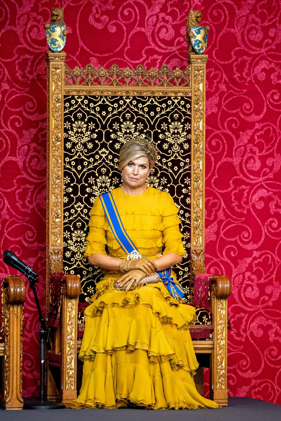 Queen Maxima of The Netherlands  on a throne